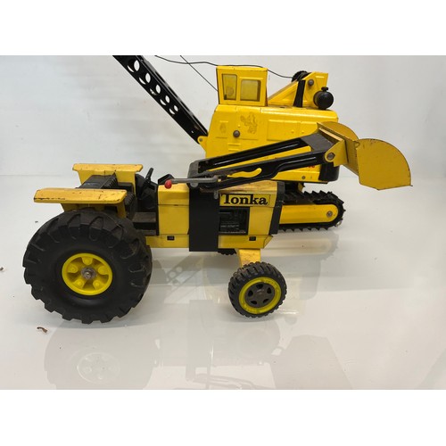 53 - Tonka toys, tinplate models a large crane and a tractor.

This lot is available for in-house shippin... 