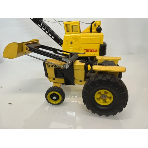 53 - Tonka toys, tinplate models a large crane and a tractor.

This lot is available for in-house shippin... 