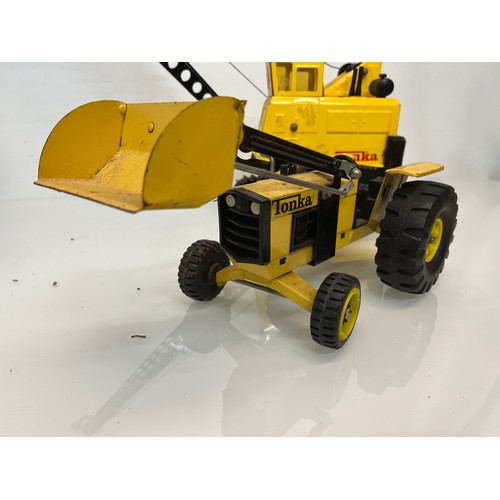 53 - Tonka toys, tinplate models a large crane and a tractor.

This lot is available for in-house shippin... 