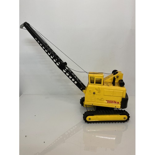 53 - Tonka toys, tinplate models a large crane and a tractor.

This lot is available for in-house shippin... 