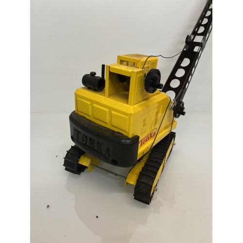 53 - Tonka toys, tinplate models a large crane and a tractor.

This lot is available for in-house shippin... 