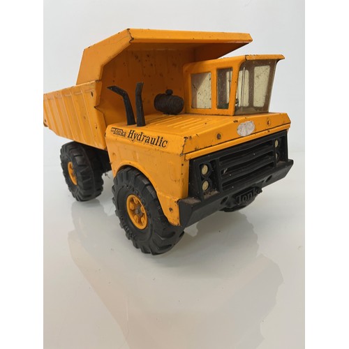 54 - Tonka toys,  tinplate models a hydraulic dump.

This lot is available for in-house shipping