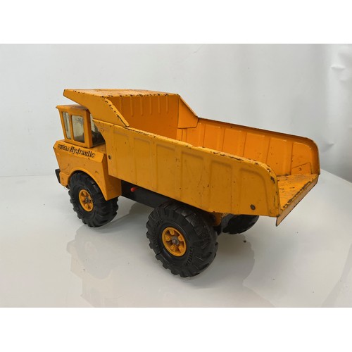 54 - Tonka toys,  tinplate models a hydraulic dump.

This lot is available for in-house shipping