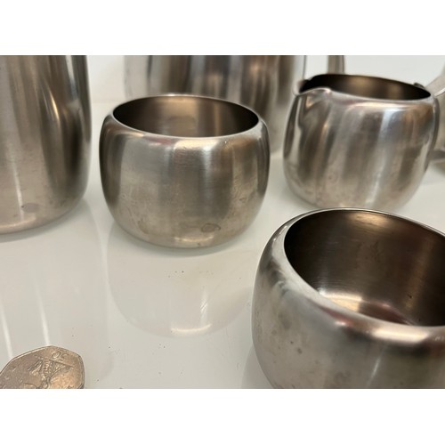 74 - Mid century stainless steel tea wares marked for Old Hall range.

This lot is available for in-house... 