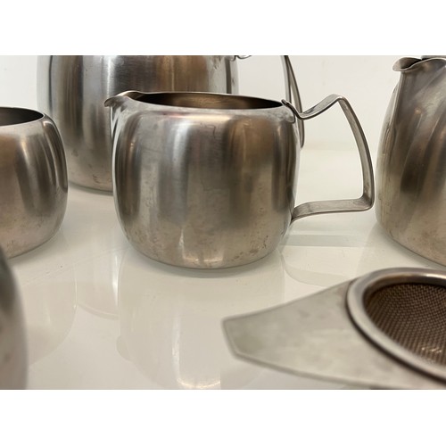 74 - Mid century stainless steel tea wares marked for Old Hall range.

This lot is available for in-house... 