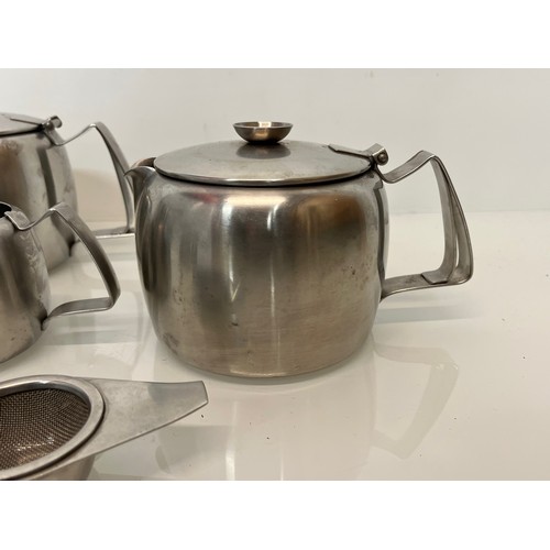 74 - Mid century stainless steel tea wares marked for Old Hall range.

This lot is available for in-house... 