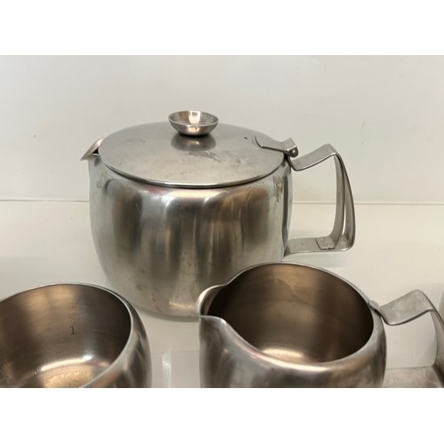 74 - Mid century stainless steel tea wares marked for Old Hall range.

This lot is available for in-house... 