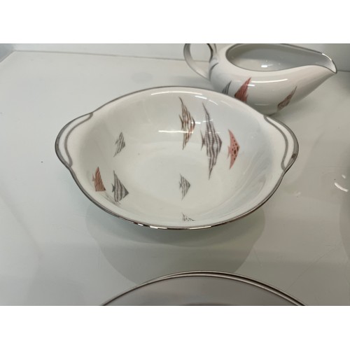 77 - Mid Century table wares decorated with Angel Fish. 

This lot is available for in-house shipping