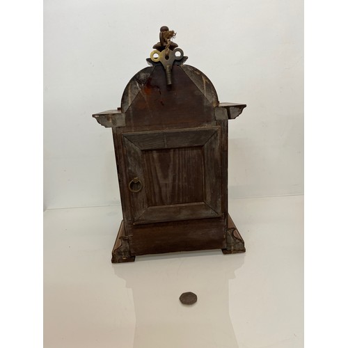 98 - Oak cased mantle clock with brass decoration.

This lot is available for in-house shipping