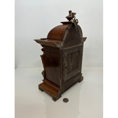 98 - Oak cased mantle clock with brass decoration.

This lot is available for in-house shipping