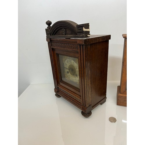 99 - Two early C20th wooden cased mantle clocks.

This lot is available for in-house shipping