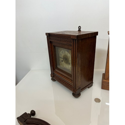 99 - Two early C20th wooden cased mantle clocks.

This lot is available for in-house shipping