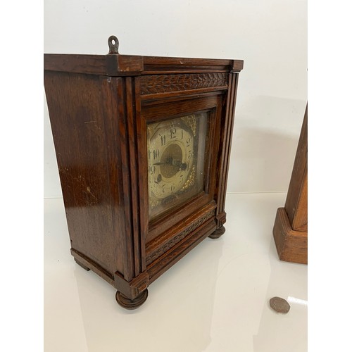 99 - Two early C20th wooden cased mantle clocks.

This lot is available for in-house shipping