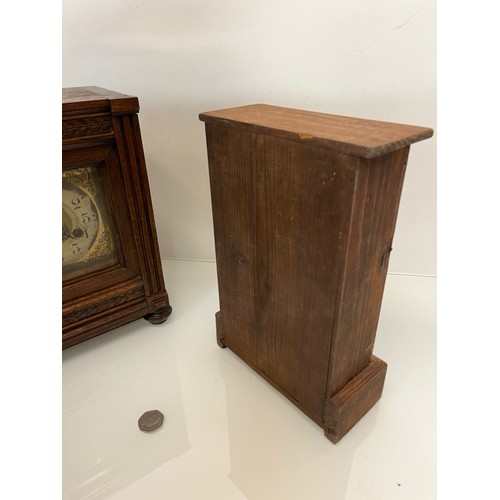 99 - Two early C20th wooden cased mantle clocks.

This lot is available for in-house shipping