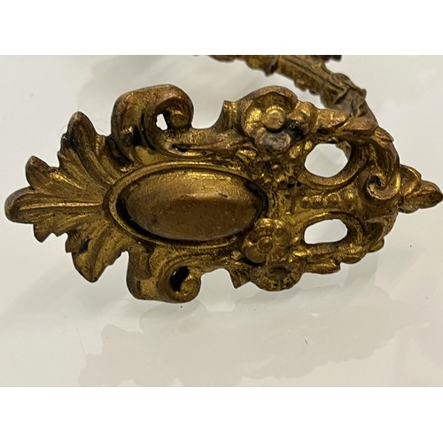 110 - Pair of Brass curtain tie backs the finials are 10cm high.

This lot is available for in-house shipp... 