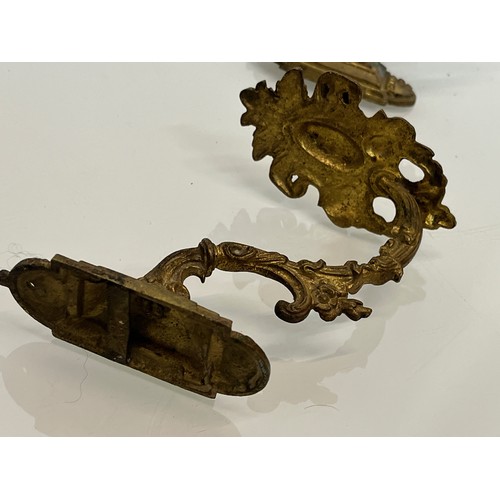 110 - Pair of Brass curtain tie backs the finials are 10cm high.

This lot is available for in-house shipp... 