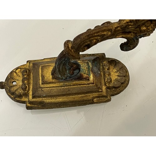 110 - Pair of Brass curtain tie backs the finials are 10cm high.

This lot is available for in-house shipp... 