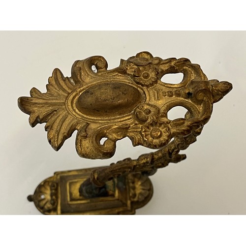 110 - Pair of Brass curtain tie backs the finials are 10cm high.

This lot is available for in-house shipp... 