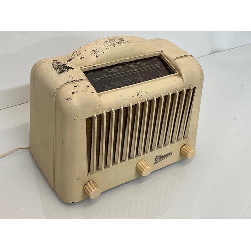 117 - An Art Deco Marconi Bakelite radio, 10 inches x 6 inches x 8 inches high.

This lot is available for... 