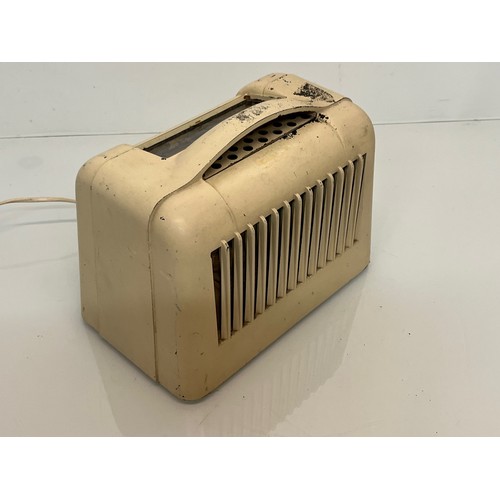 117 - An Art Deco Marconi Bakelite radio, 10 inches x 6 inches x 8 inches high.

This lot is available for... 