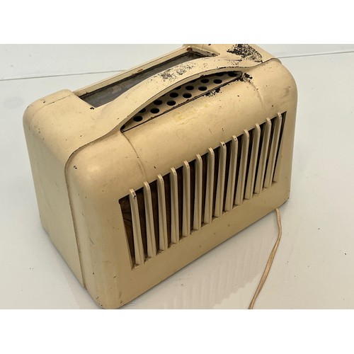 117 - An Art Deco Marconi Bakelite radio, 10 inches x 6 inches x 8 inches high.

This lot is available for... 