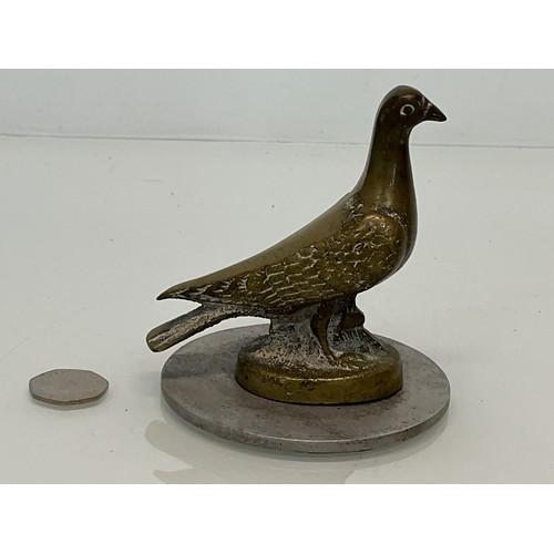 129 - Automobilia, a cast motor car mascot in the form of a Pidgeon.

This lot is available for in-house s... 