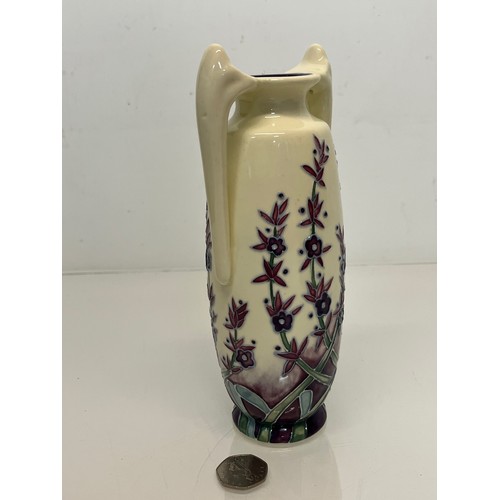 136 - Old Tupton Ware pottery, a two handled Art Nouveau design vase, boxed.

This lot is available for in... 