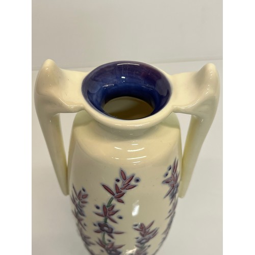 136 - Old Tupton Ware pottery, a two handled Art Nouveau design vase, boxed.

This lot is available for in... 