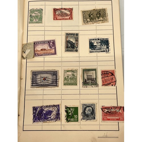 541 - Philately, an album of world Stamps and an envelope of loose stamps.

This lot is available for in-h... 