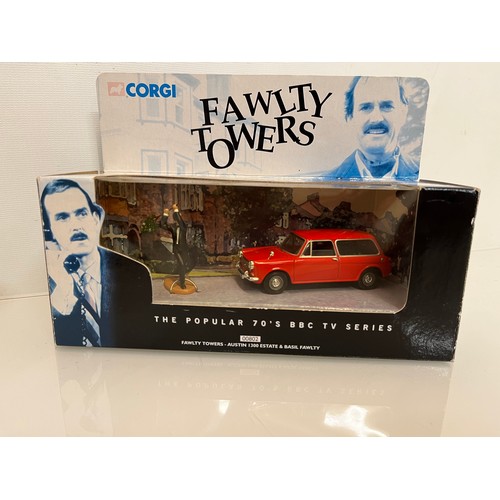 393 - Die cast toy cars, Dinky Corgi etc, includes a boxed Faulty Towers Austin 1100.

This lot is avaialb... 