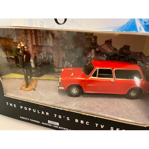 393 - Die cast toy cars, Dinky Corgi etc, includes a boxed Faulty Towers Austin 1100.

This lot is avaialb... 