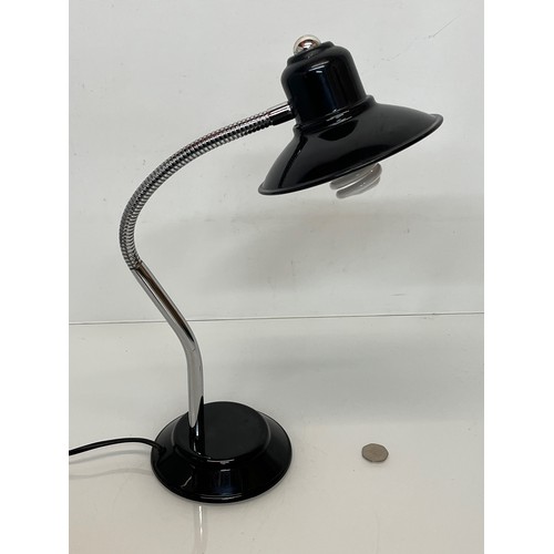 84 - Mid century furniture, an adjustable desk lamp with enamelled steel shade and base.

This lot is ava... 