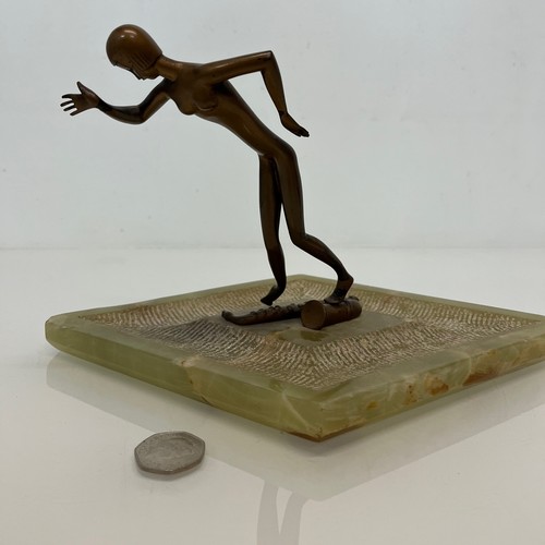 20 - Austrian Art Deco Bronze Figure Jazz Dancer on an Onyx base,  K. Hagenauer 29 cm long.

This lot is ... 