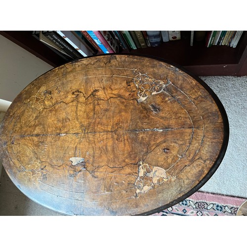 325 - Oval topped side table with inlaid decoration.

This lot is collection only.