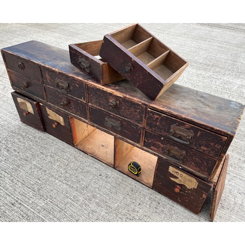 335 - Industrial wooden furniture, two sets of workshop storage drawers, and parts a shown in the photogra... 