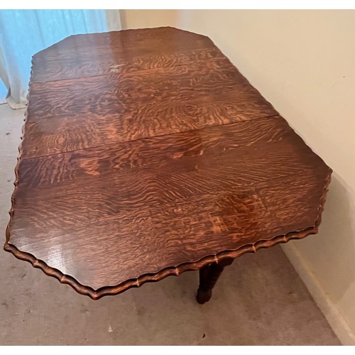 348 - Edwardian drop leaf dinning table with a pie crust edging design to the top and raised on barley twi... 