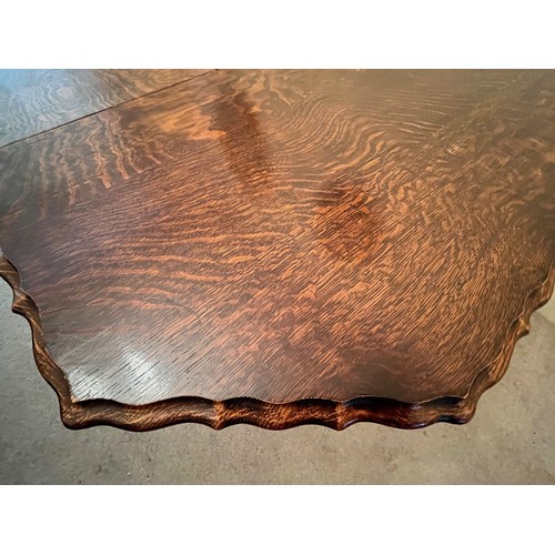 348 - Edwardian drop leaf dinning table with a pie crust edging design to the top and raised on barley twi... 