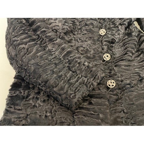 97 - Ladies full length fur coat, marked for south west African lamb, Swiss furriers mark.

This lot is a... 