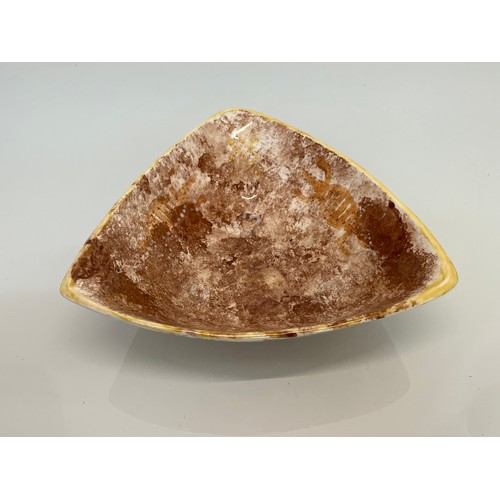 446 - Art pottery triangular shaped dish marked GS to the base, 24 cm and 7 cm deep

This lot is available... 