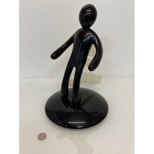 117 - C20th Italian designer Guzzini, a black body figure knife stand.

This lot is available for in-house... 