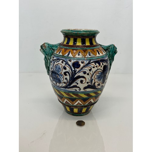 119 - Hand decorated majolica vase, 26 cm high.

This lot is available for in-house shipping