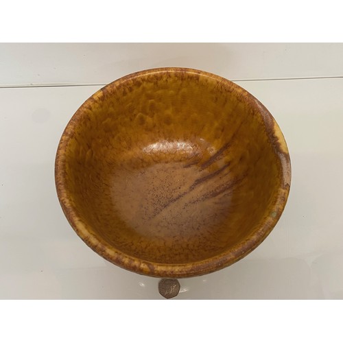 120 - Treacle glazed stoneware bowl, 25 cm diameter and 13 cm high.

This lot is available for in-house sh... 