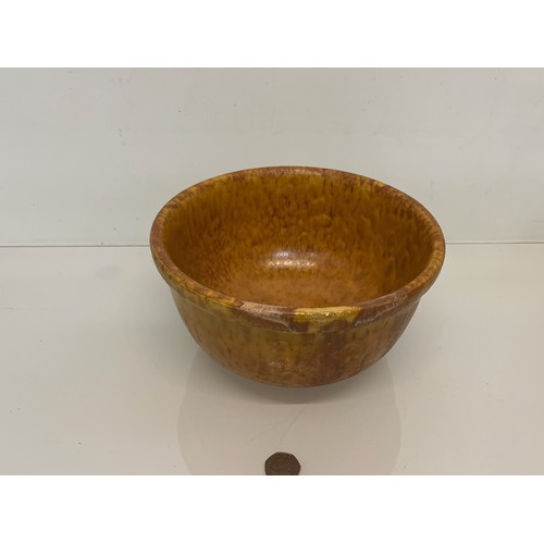 120 - Treacle glazed stoneware bowl, 25 cm diameter and 13 cm high.

This lot is available for in-house sh... 