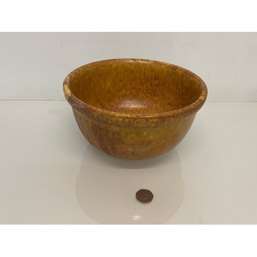 120 - Treacle glazed stoneware bowl, 25 cm diameter and 13 cm high.

This lot is available for in-house sh... 