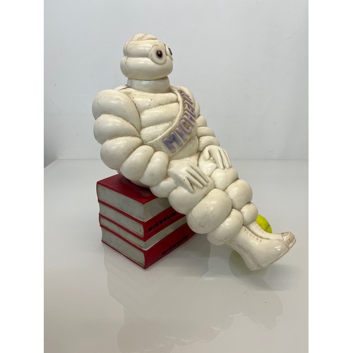 184 - Automobilia, a Michelin Man mascot, illuminated shop / garage retail display with Mr Bibendum seated... 