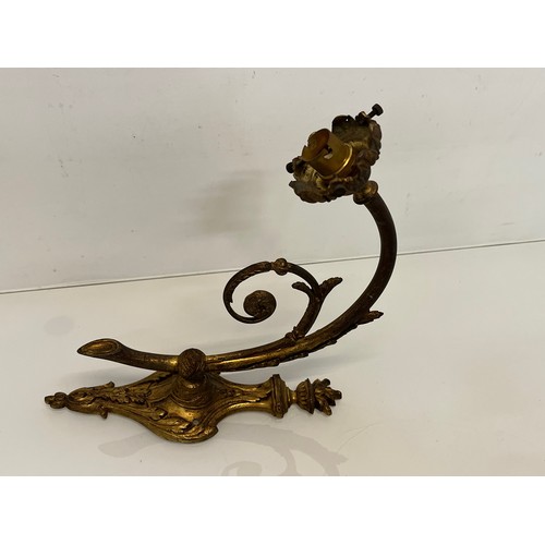 191 - Pair of gilded cast brass decorative light sconces.

This lot is available for in-house packing and ... 