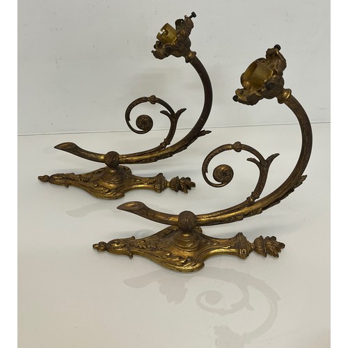 191 - Pair of gilded cast brass decorative light sconces.

This lot is available for in-house packing and ... 