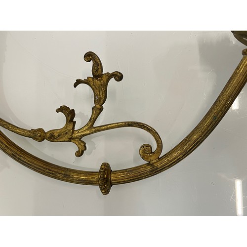 192 - Pair of gilded cast brass decorative light sconces.

This lot is available for in-house packing and ... 