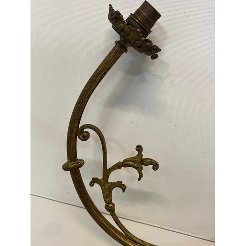 192 - Pair of gilded cast brass decorative light sconces.

This lot is available for in-house packing and ... 