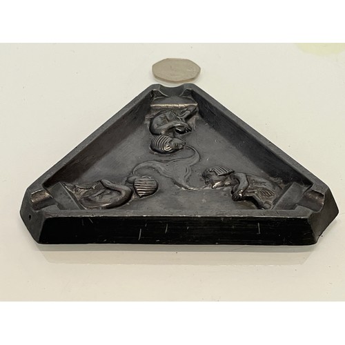 194 - Cast pewter ashtray decorated with three fawn like figures blowing smoke.

This lot is available for... 